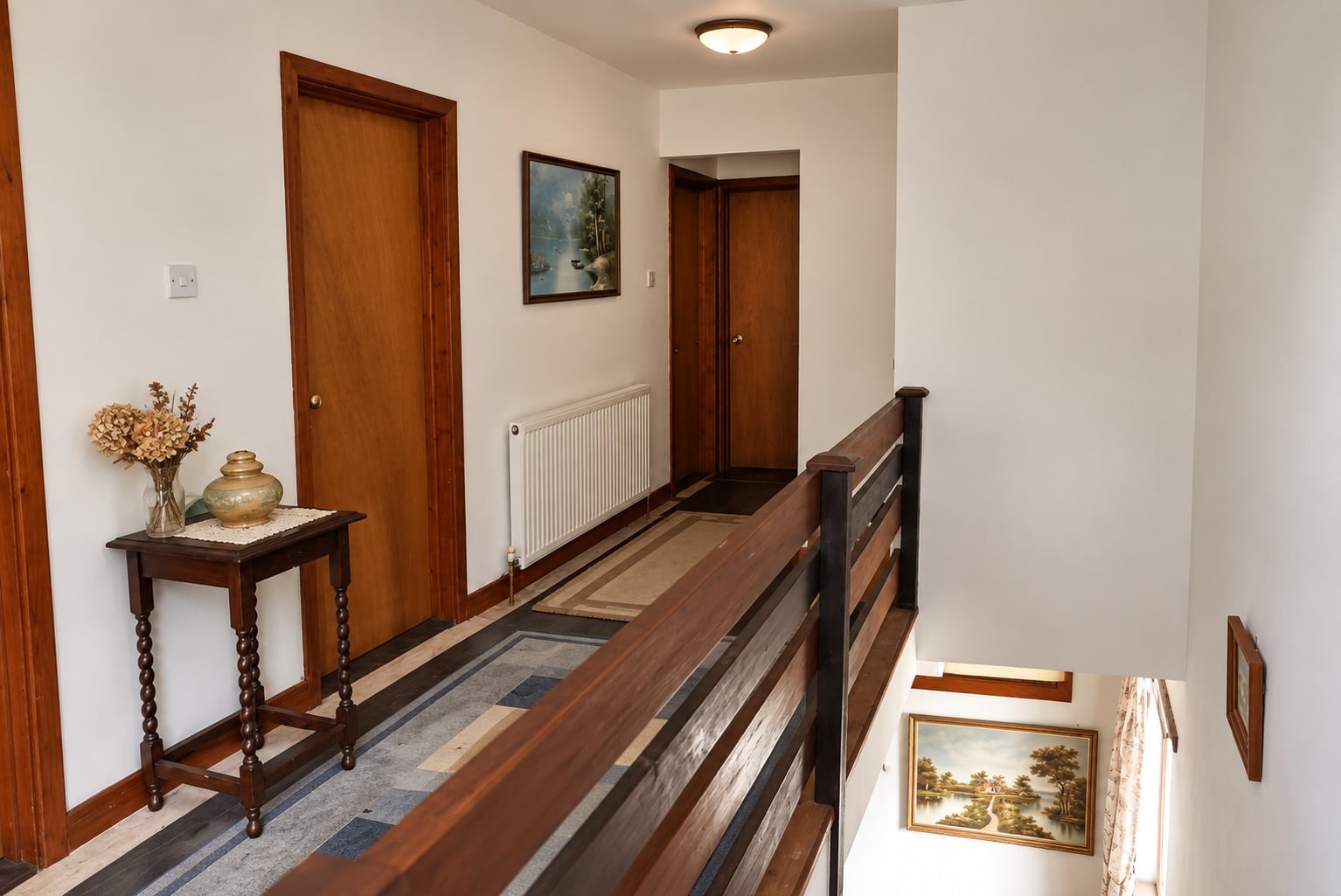 Upstairs landing with a wooden balustrade